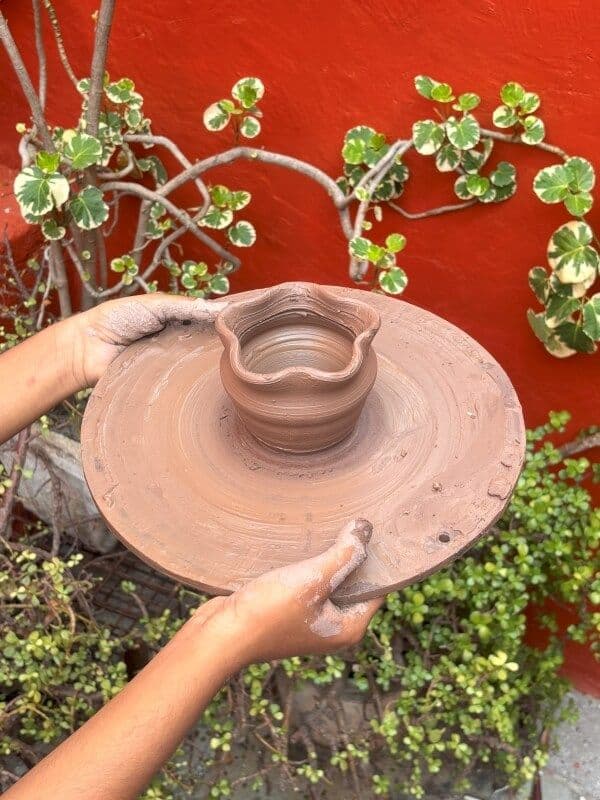 Clay pottery on a wheel