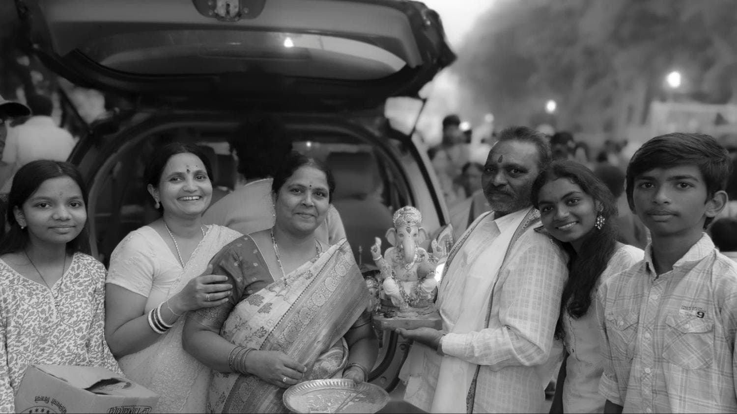 Family with Ganesh idol
