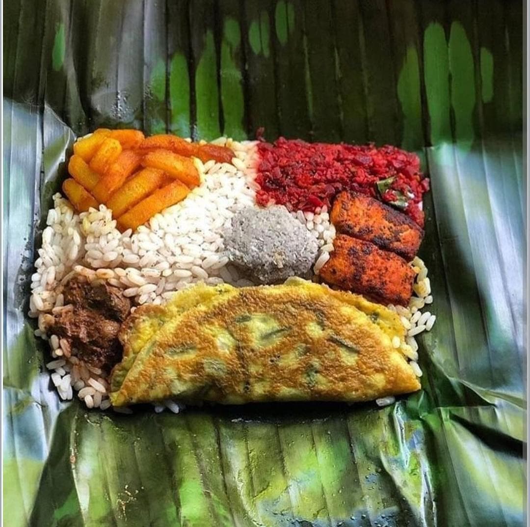 The authentic dish of Kerala which involves wrapping rice with curry, fish and stir fry served on banana leaf