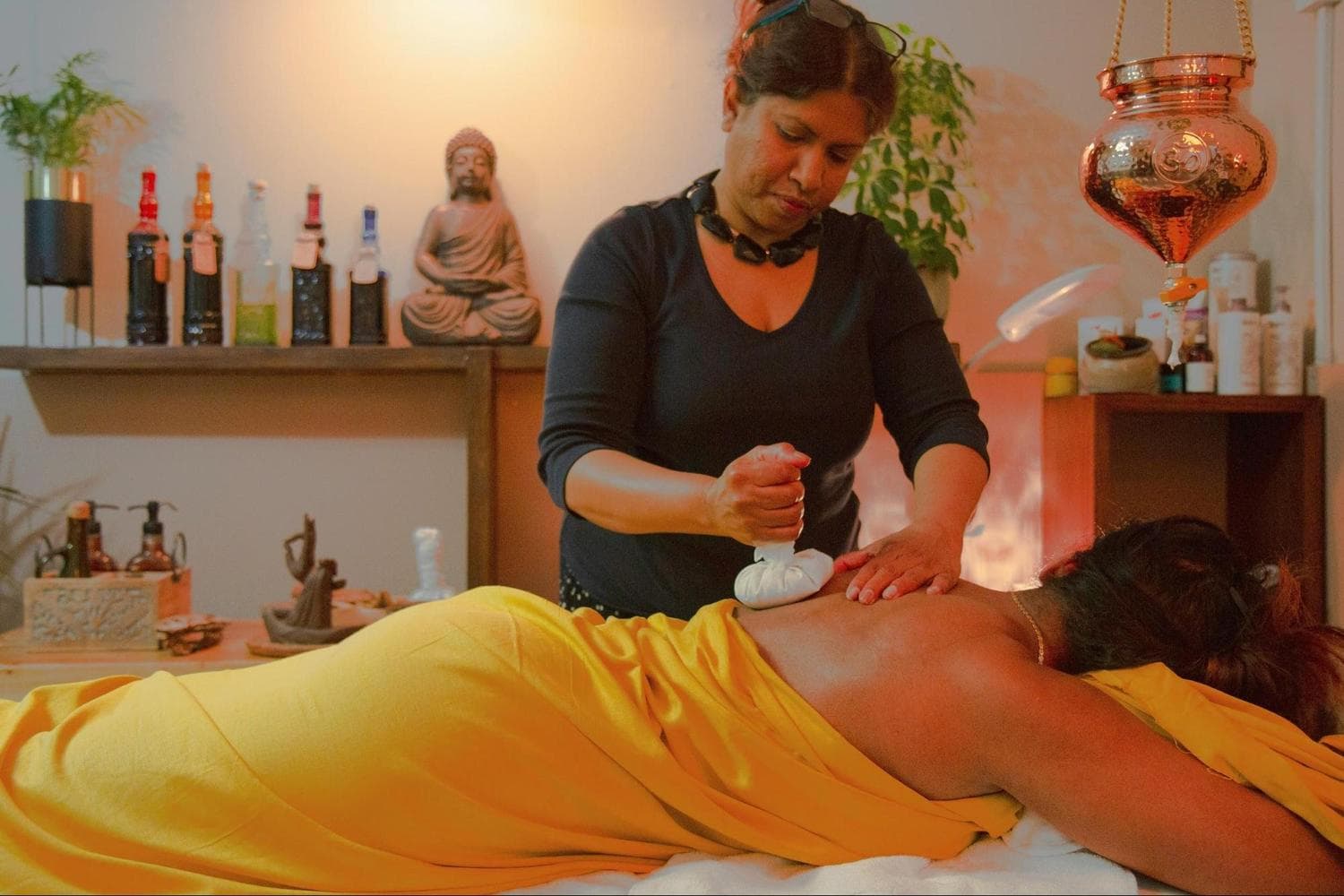 A woman receiving a Body massage